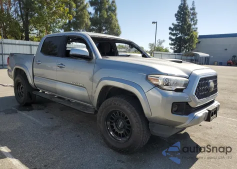 2018 Toyota Tacoma Double Cab z USA, uszkodzony, nr VIN 3TMAZ5CN0JM056811